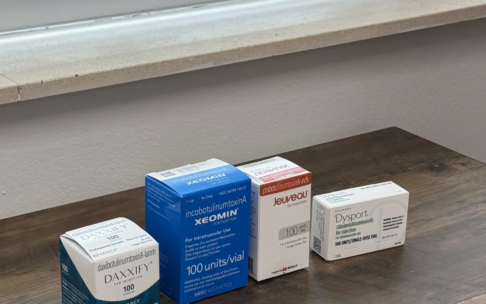 Boxes of Daxxify, Xeomin and Dysport, the three neurotoxins stocked at The Ginger Injector
